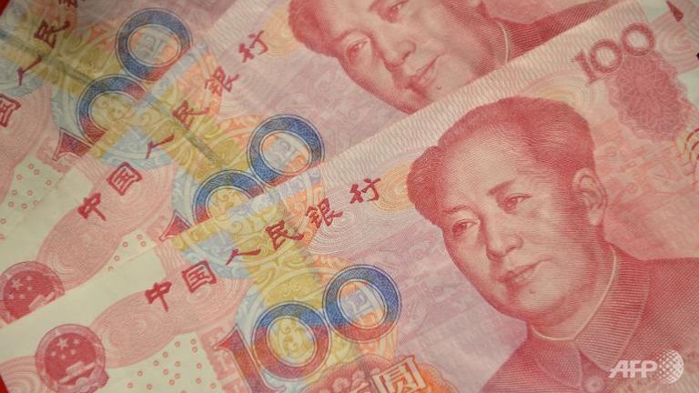 Offshore Chinese yuanChinese yuan notes. (AFP/Peter Parks)