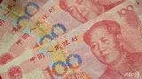 Offshore Chinese yuanChinese yuan notes. (AFP/Peter Parks)